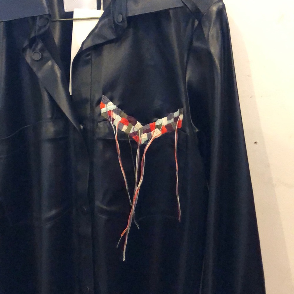 Danielle Romero’s waterproof button down jacket. - Picture 3 of 3